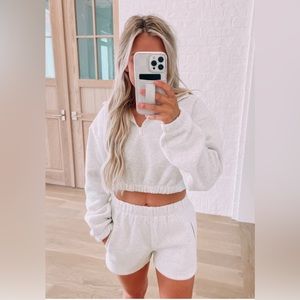 Cropped sweatshirt & shorts set.